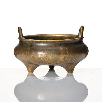 A tripod bronze censer, 17/18th Century with Xuande mark.