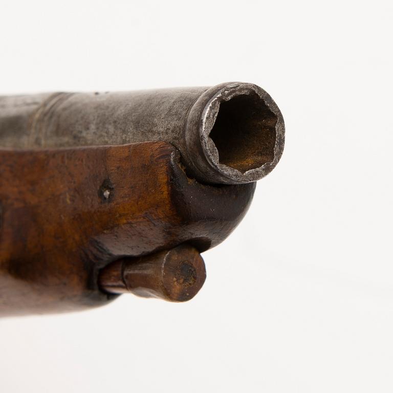 An early 19th Century flintlock pocket pistol.