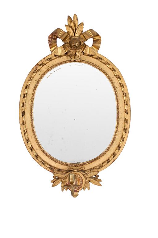 A pair of Gustavian 1780's one-light girandole mirrors by C. G. Fyrwald.