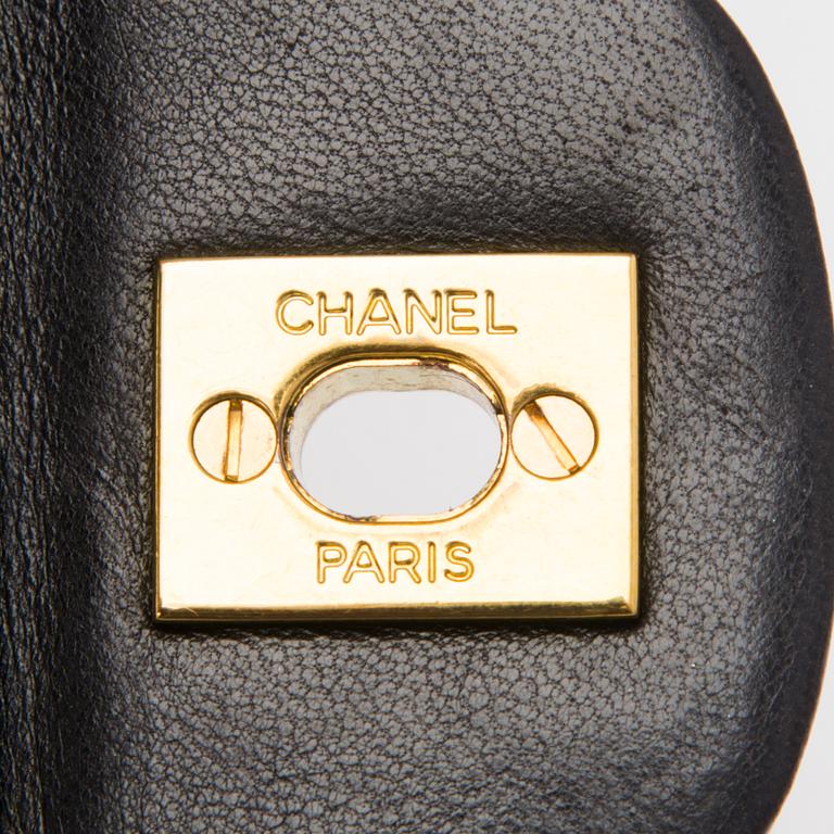 A Black Double Flap Bag.