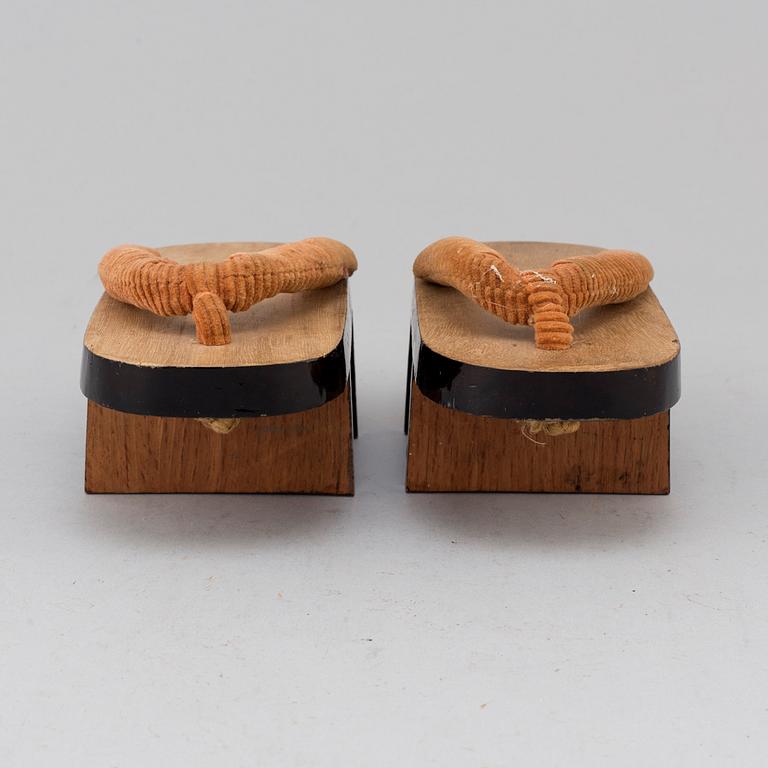A pair of Japanese 'Geta' shows and two Chinese pouches, early 20th century.