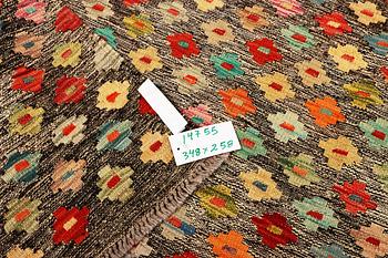 A Kilim carpet, c. 348 x 258 cm.