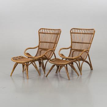 A pair of ratten armchairs and stools. Sika-Design.