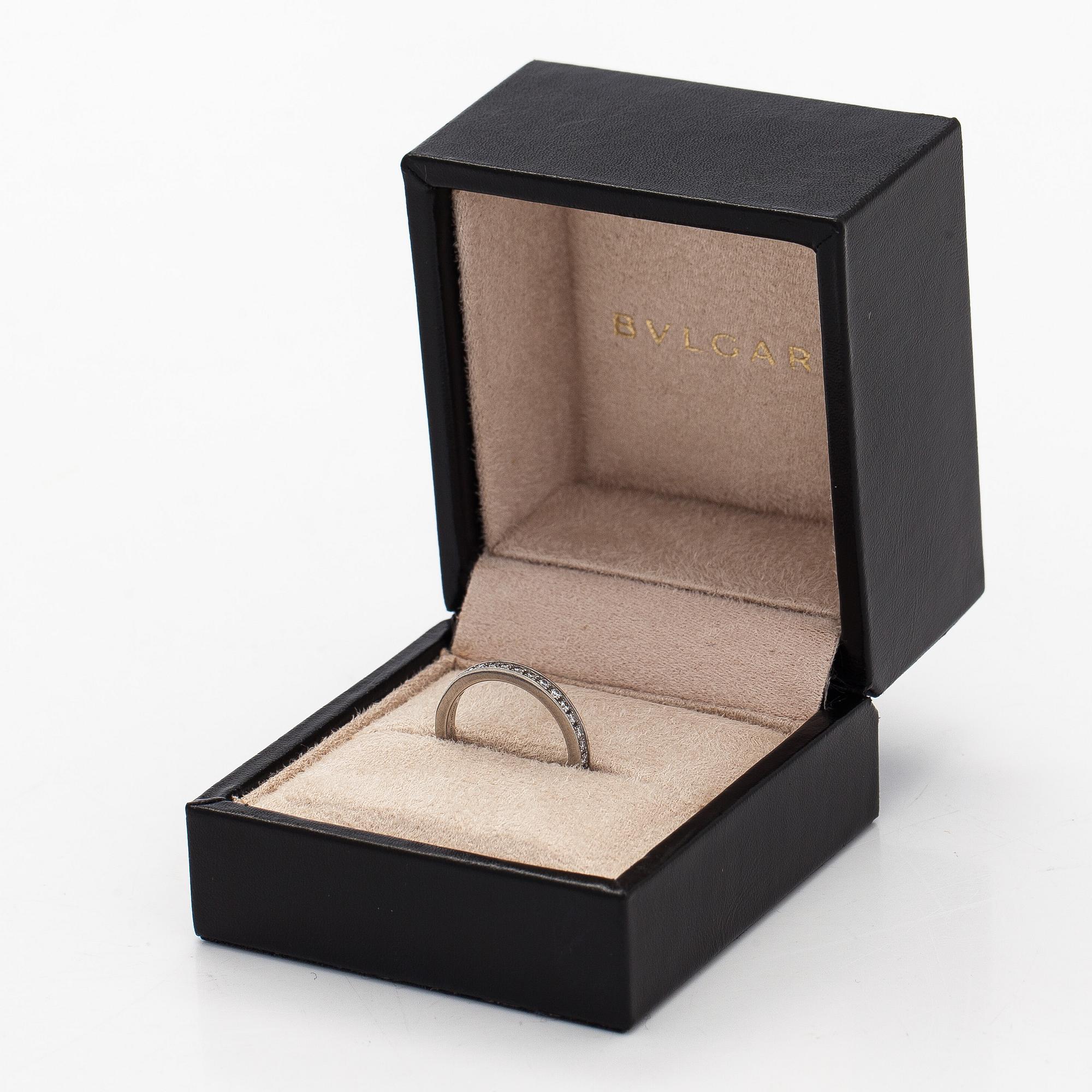 Bulgari, a platinum 'Venezia' ring with brilliant-cut diamonds.
