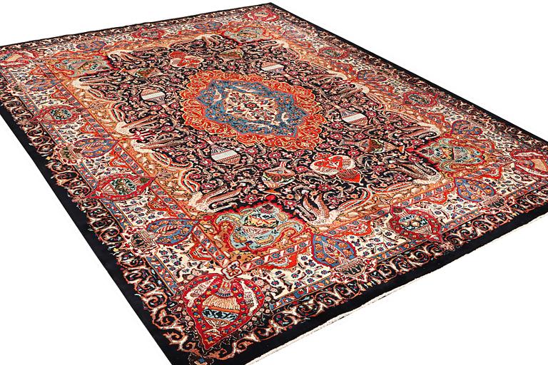 A Kashmar carpet, a. 390 x 305 cm.