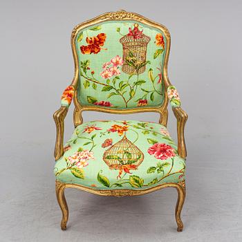 A late 20th century rococo-style armchair.