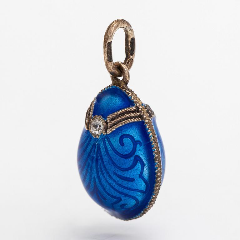 A gilded silver egg pendant with enamel and diamonds ca 0.05 ct in total, Soviet Union.