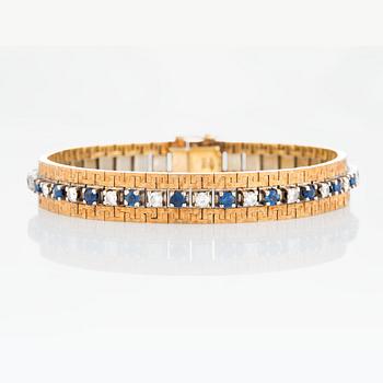 1080. An 18K gold bracelet set with brilliant-cut diamonds ca 1 ct and faceted sapphires ca 1.5 ct.