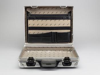 A set of three Rimowa bags later part of the 20th century.