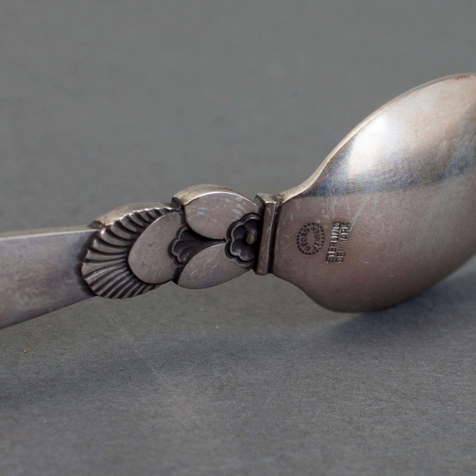 A set of 12+6 spoons by Georg Jensen,