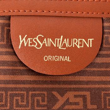 YVES SAINT LAURENT, a black canvas and brown leather suitcase.