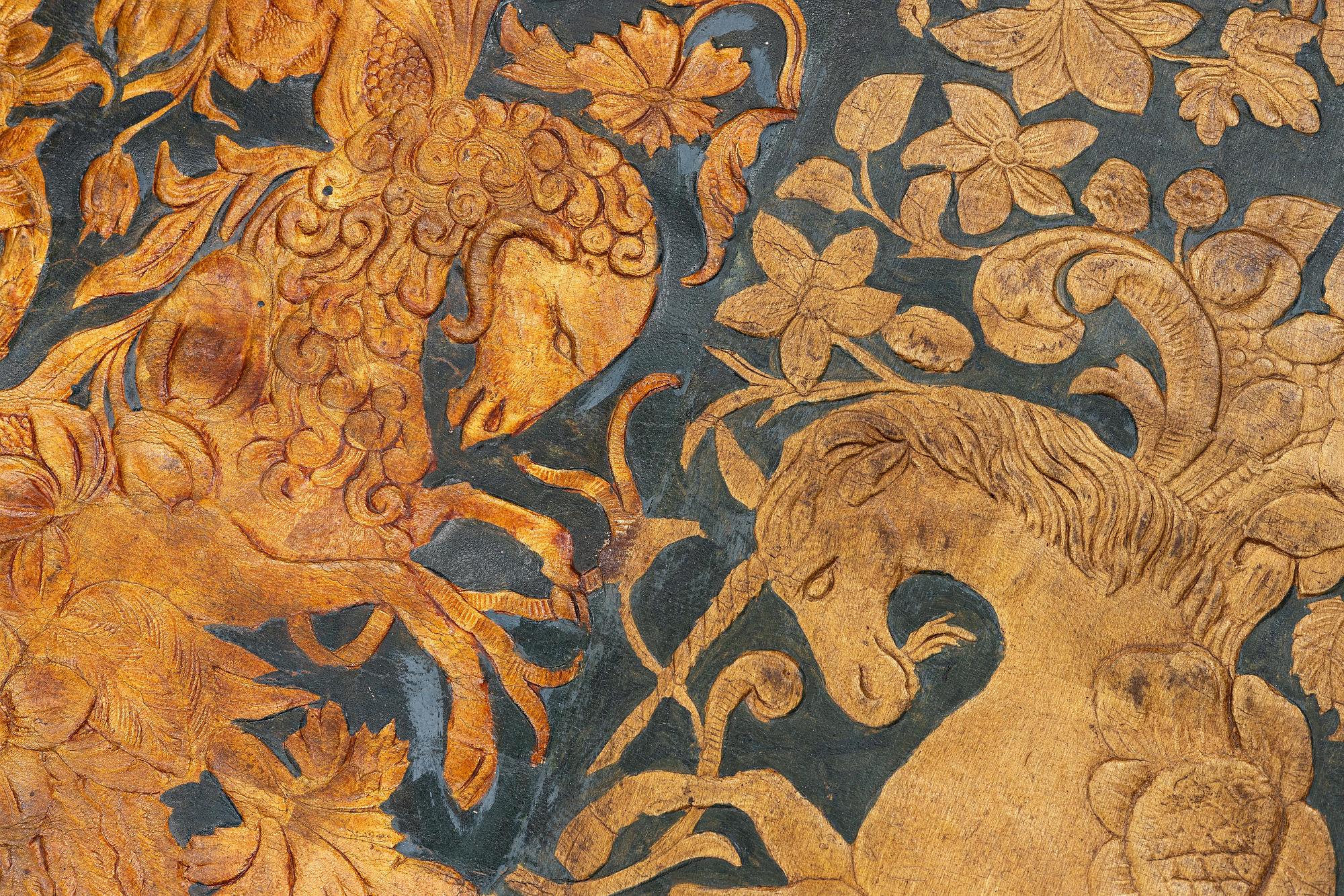 A 19th century wrought leather wallpaper, ca 388 x 97 cm.
