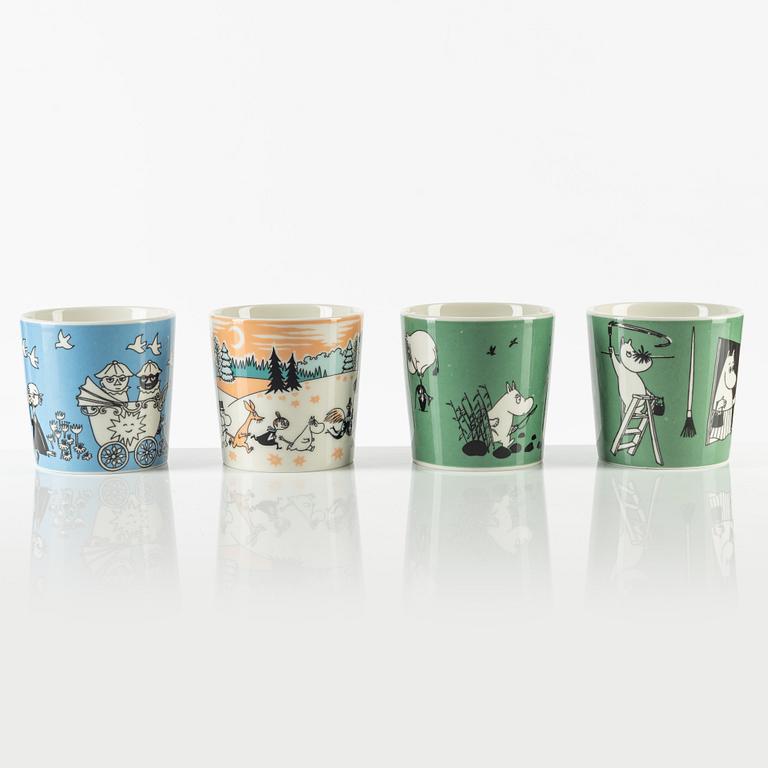 Four porcelain Moomin mugs, Arabia, Finland.