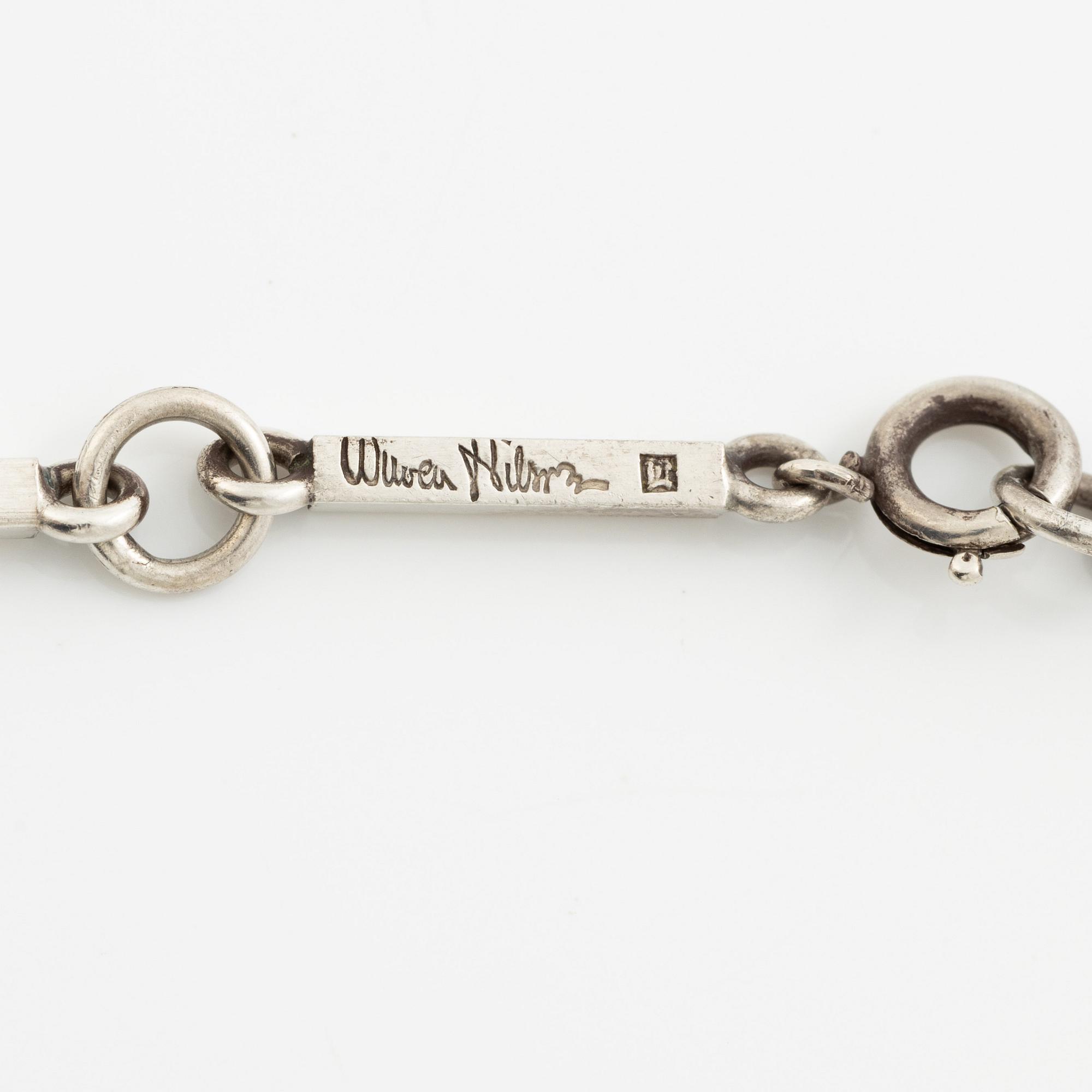 Wiwen Nilsson, a pendant in the form of a cross, sterling silver with onyx and step-cut rock crystal, Lund 1937.