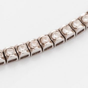 Collier rivière 18K vitguld runda briljantslipade diamanter.