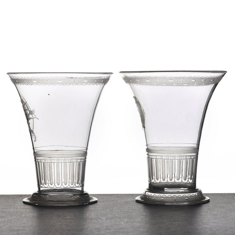 Simon Gate, two Swedish Grace engraved glass beakers, Orrefors, Sweden 1924.