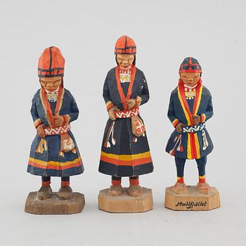 Three wooden figures by Georg Jonsson, signed GJ.