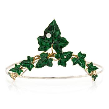 585. A necklace/tiara combination in 18K gold and green enamel set with old-cut diamonds.