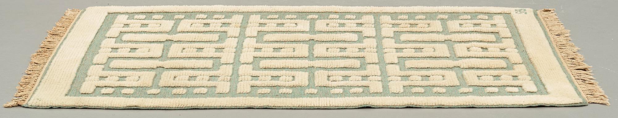 Sigvard Bernadotte, A CARPET, knotted pile in relief, ca 178 x 112 cm, signed SB (Sigvard Bernadotte).
