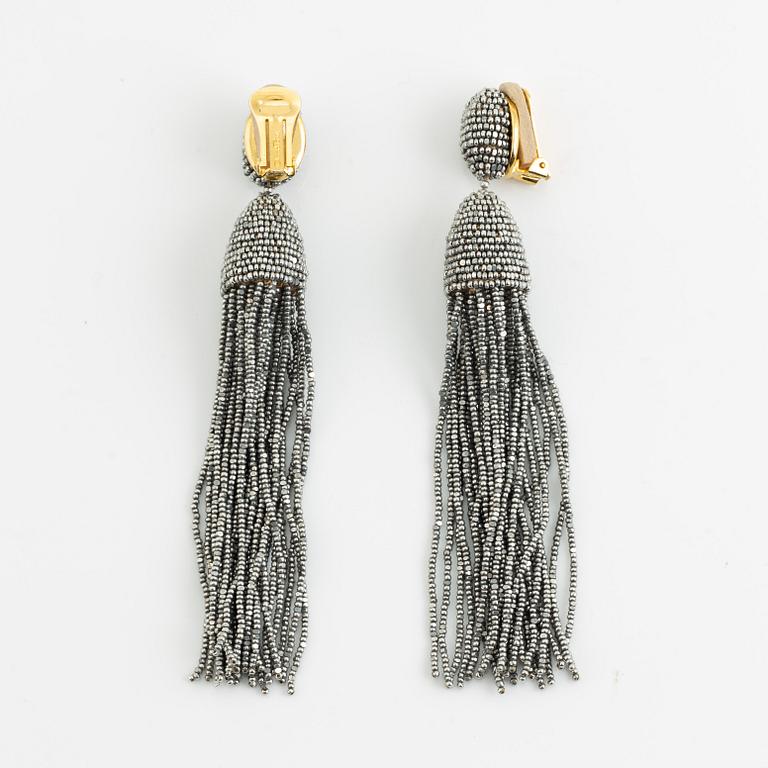 Oscar De La Renta, tassel earrings.