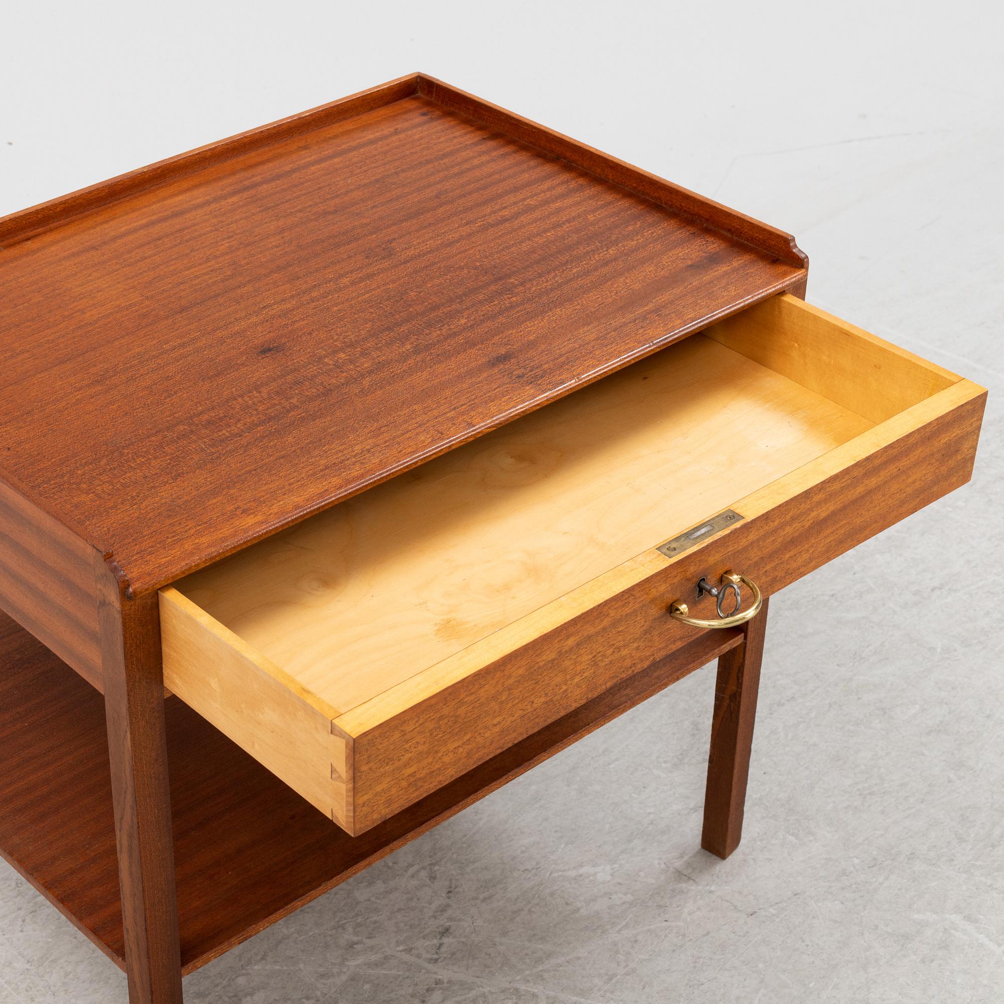 Josef Frank, a mahogany veneered side table, Firma Svenskt Tenn.