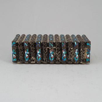 A Chinese copper plated with silver and alpaca and enamelled box with cover, 20th century.