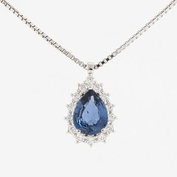 Pendant with 18K gold chain featuring a faceted sapphire and round brilliant-cut diamonds.