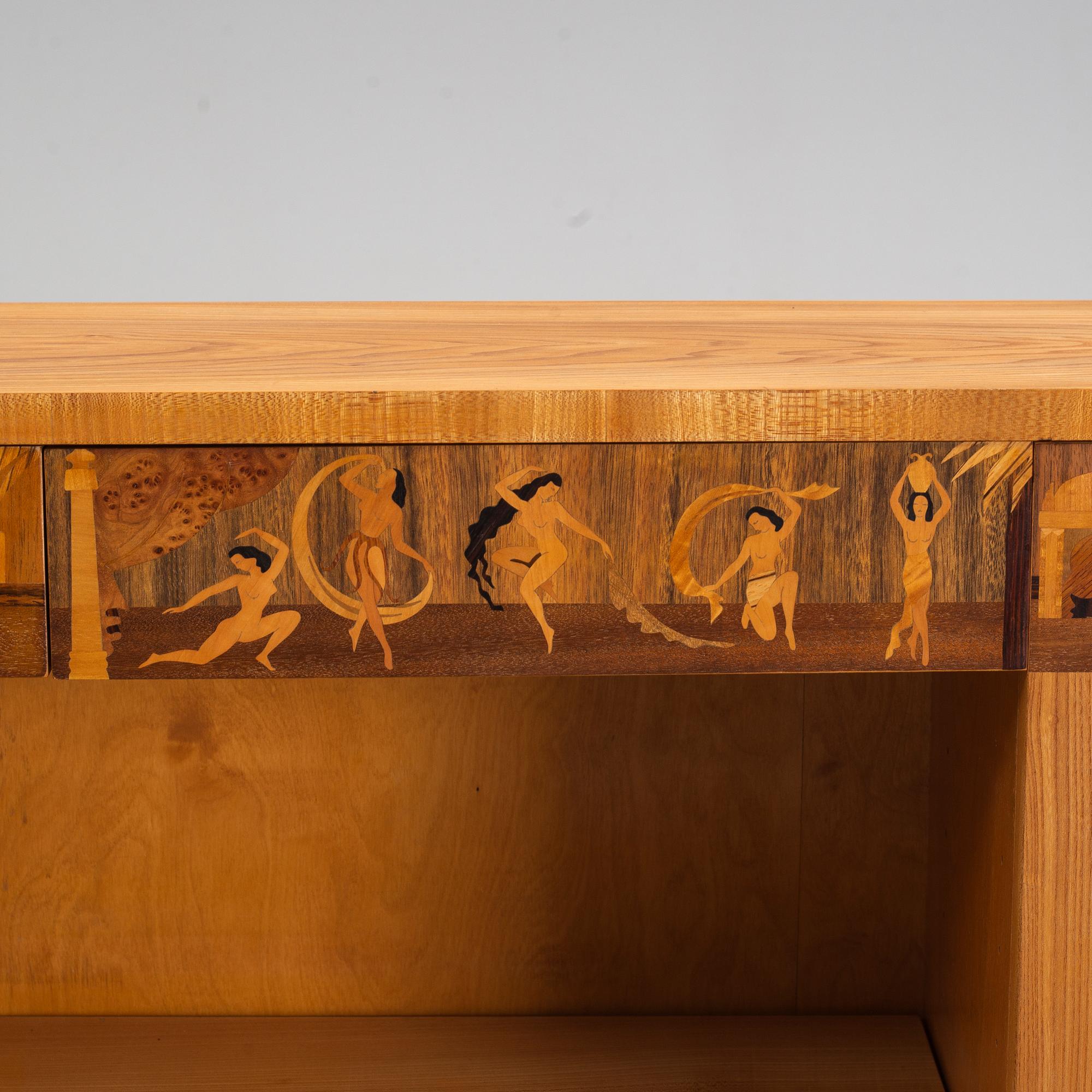 An inlaid bookcase from Mjölby Intarsia, 1930's.