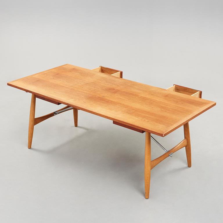 Hans J. Wegner, skrivbord, teak och ek med stålstag, "JH 571", Johannes Hansen, Danmark 1950-60-tal.