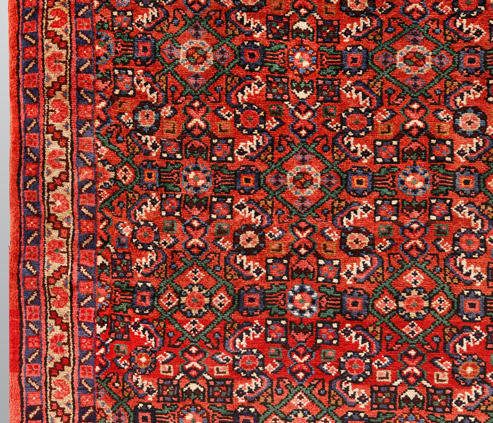 A Hosseinabad runner, ca 427 x 110 cm.