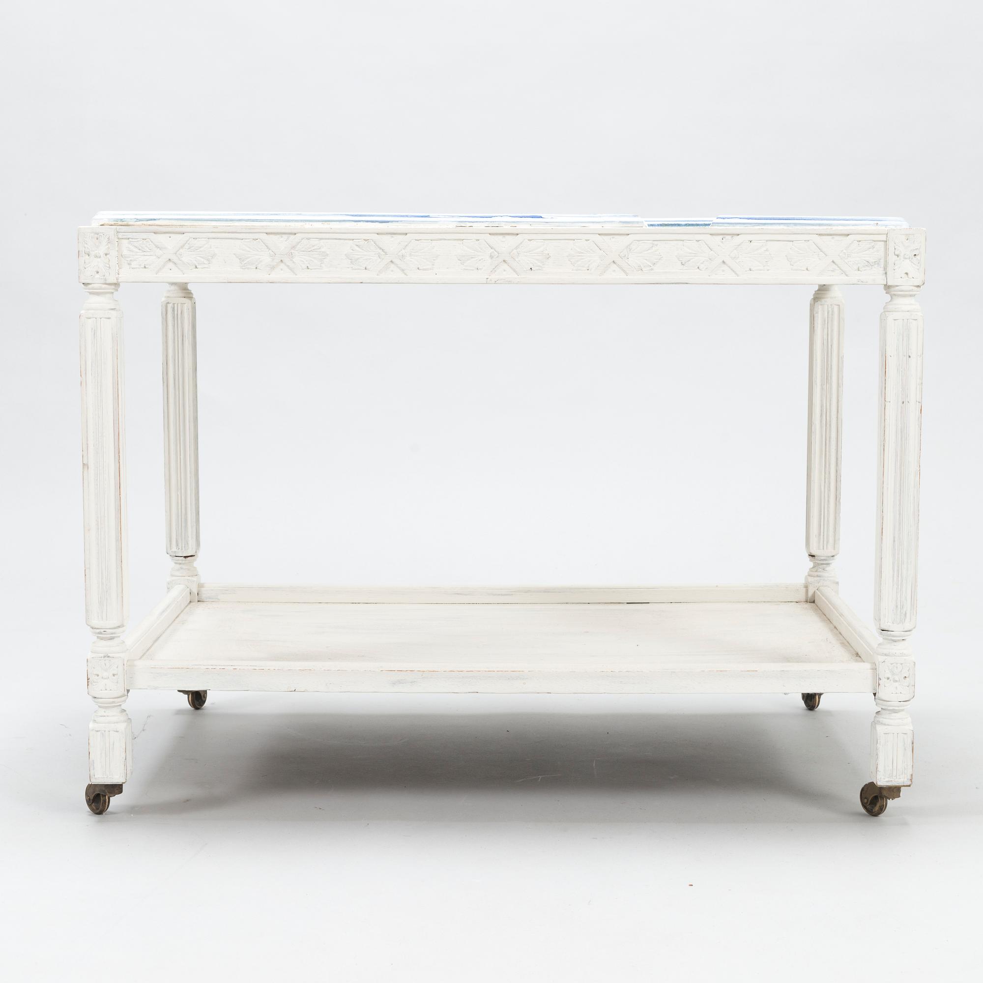 BIRGER KAIPIAINEN, A tray table/tea trolley signed Kaipiainen 1942, Arabia.