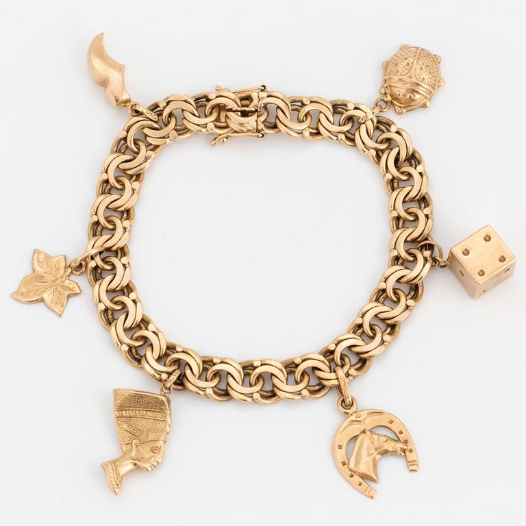 A 18K gold bismark-link, charm-bracelet.