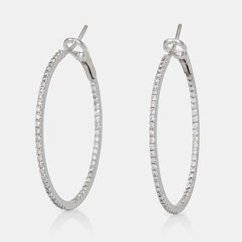 689. A pair of brilliant-cut diamond hoop earrings. Total carat weight circa 1.00 ct.