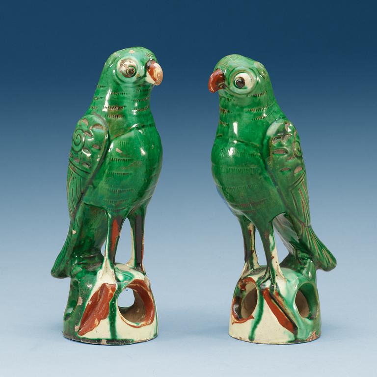 A set of two green glazed falcons, late Qing dynasty.