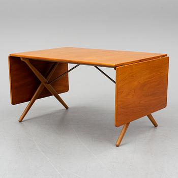 HANS J WEGNER, a teak and oak drop-leaf dining table, Andreas Tuck, Denmark 1950'-60's.