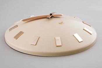 A 20th century wall clock by LM Ericsson.