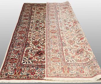 A CARPET, Tabriz, signed, ca 338 x 254 cm.