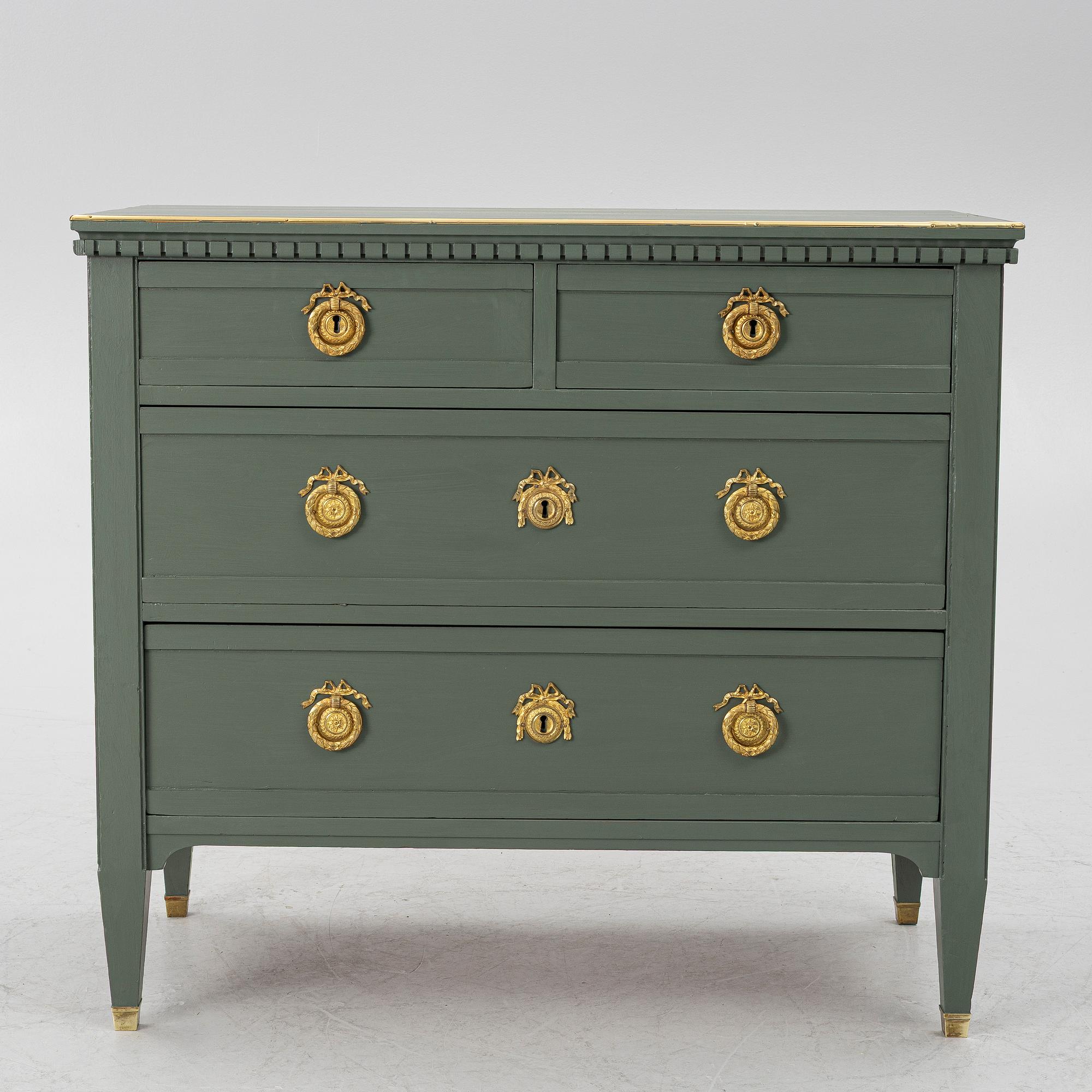 A Gustavian style chest of drawers, circa 1900.