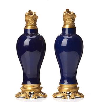 A pair of gilt bronze mounted vases, Qing dynasty, Qianlong (1736-95). French bronze mounts.