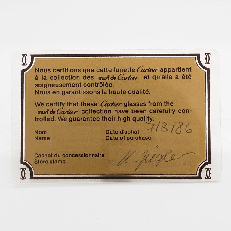 must de Cartier, Santos, Glasögonbågar. Märkta Cartier, Paris, Made in France 135, 54, 16.