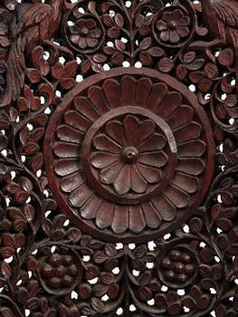 A pair of carved 'blackwood' armchairs, Bombay presidency, British Raj, circa 1880.