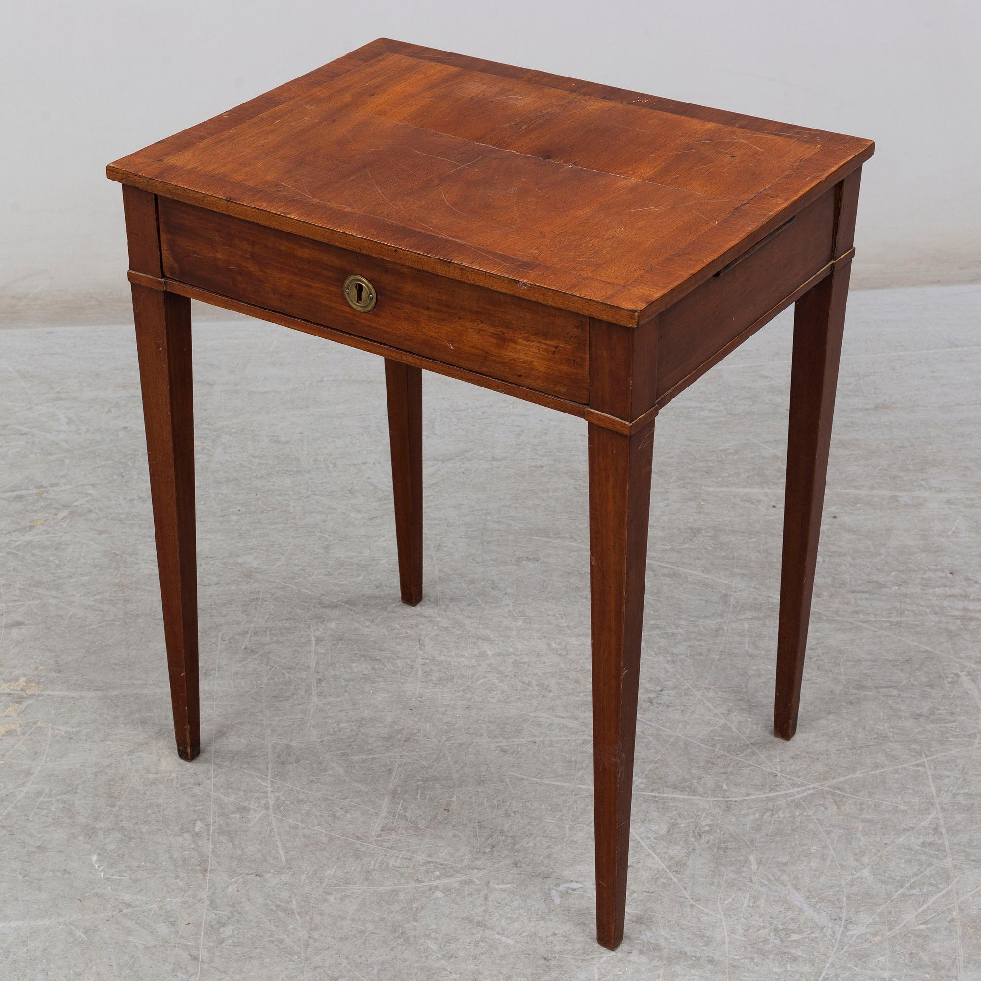 A late gustavian sewing table, ca 1800.