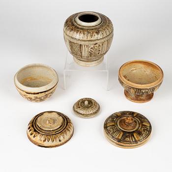 A group of three brown Sawankhalok jars with covers, Thailand, 14th/17th Century.