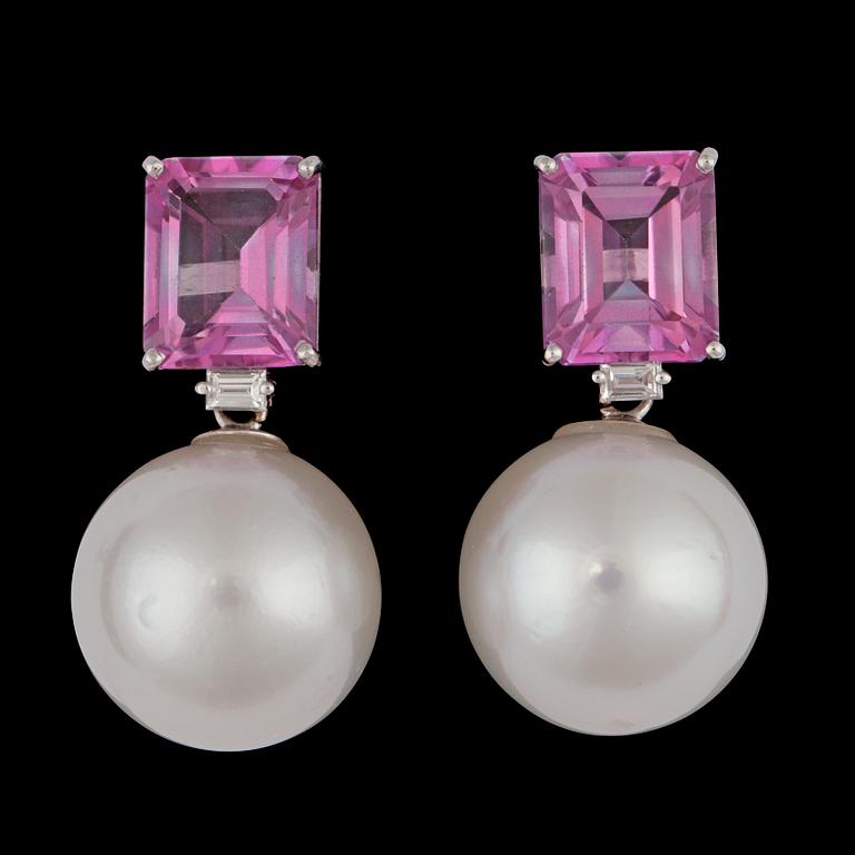 A pair of cultured South sea pearl and pink topaz earrings.
