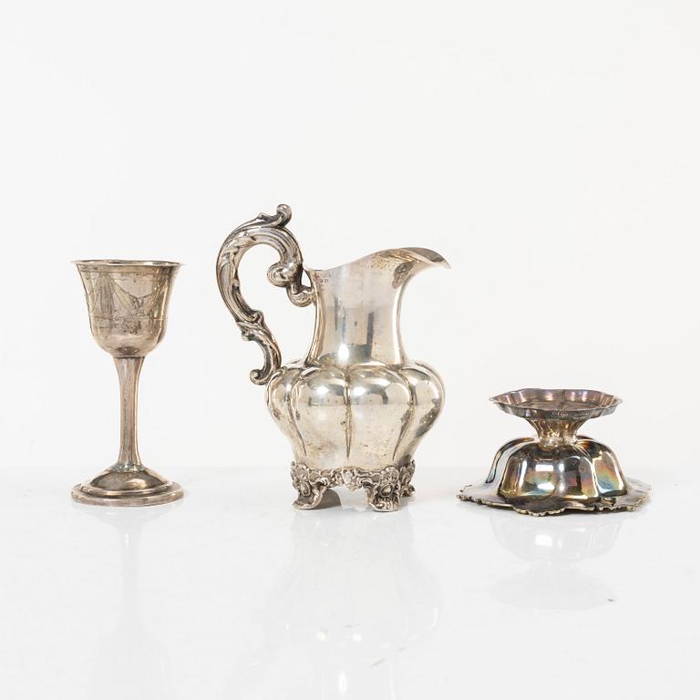 Cream jug, bowl on foot, and a cup, early to mid-19th century.