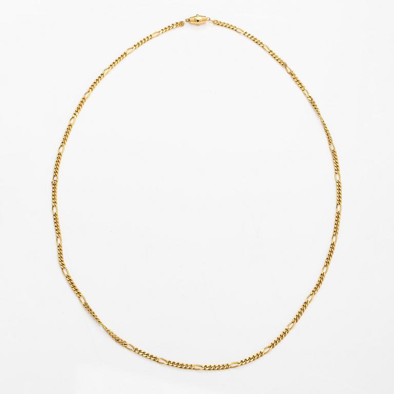 An 18K gold neckalce with stones. Erling Kaj Oy Ab, Helsinki 1977.
