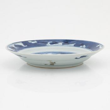 A Chinese dinner plate and a Japanese imari bowl, 18th Century together with a Chinese 19th Century jar with cover.
