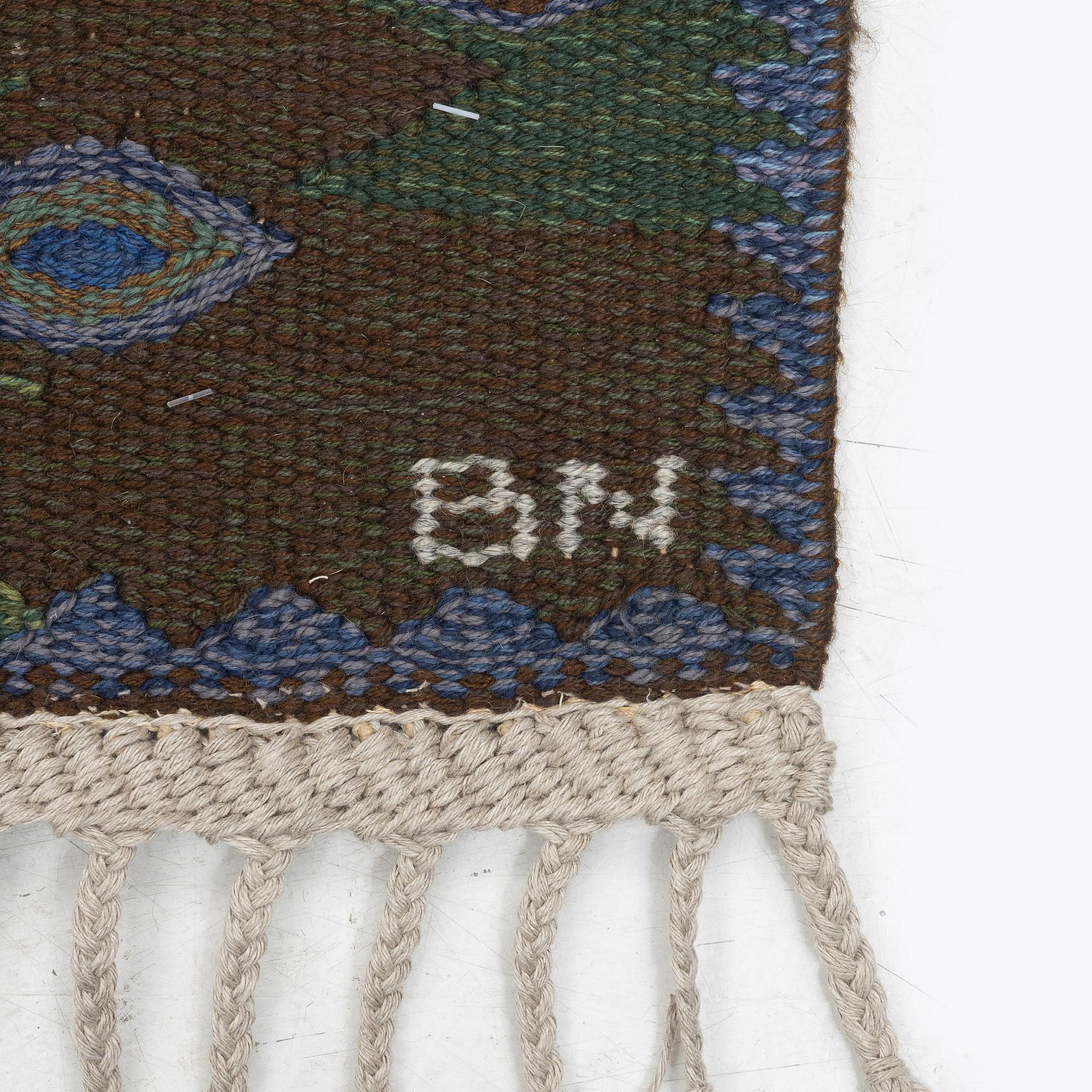 Barbro Nilsson, a carpet, 'Tånga brun och grön', tapestry weave, c. 286 x 186 cm, signed AB MMF BN.