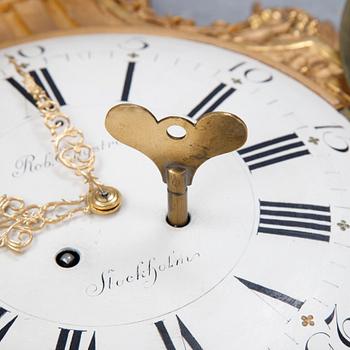 A gustavian style wall clock, signed Rob. Engström, Stockholm. First half of the 20th century.