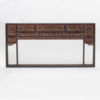 A Chinese gilt and lacquer wooden mirror, 20th century.